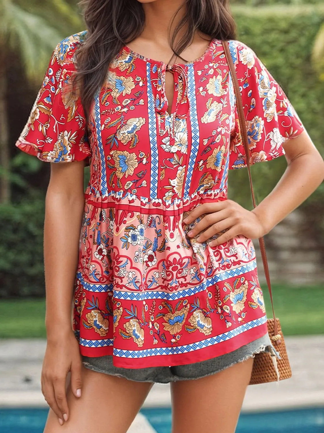 Floral Print Tie Neck Flutter Sleeve Blouse.