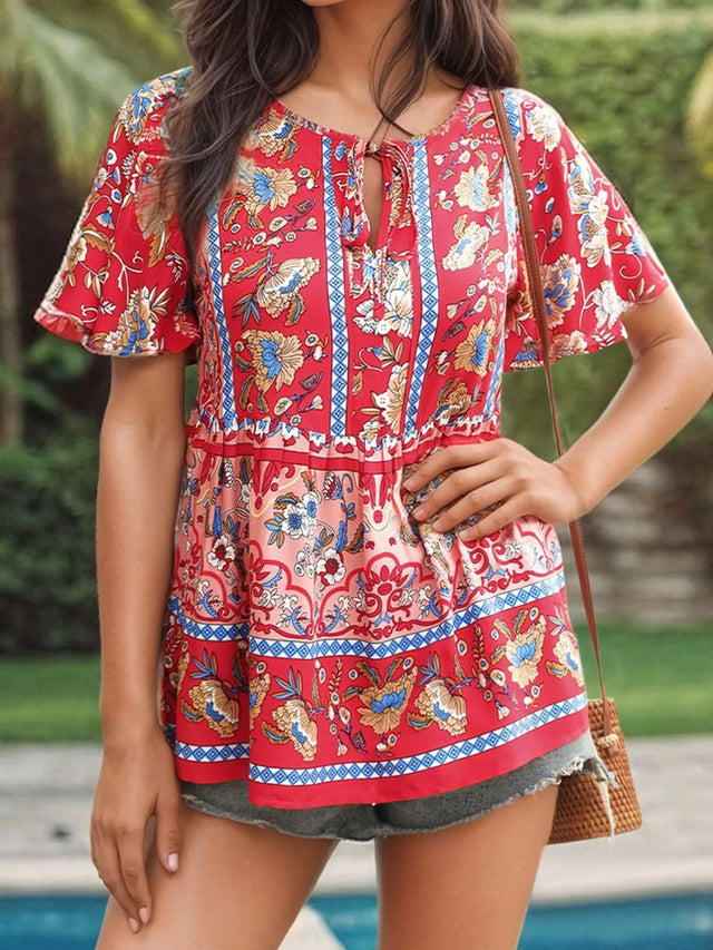 Floral Print Tie Neck Flutter Sleeve Blouse.