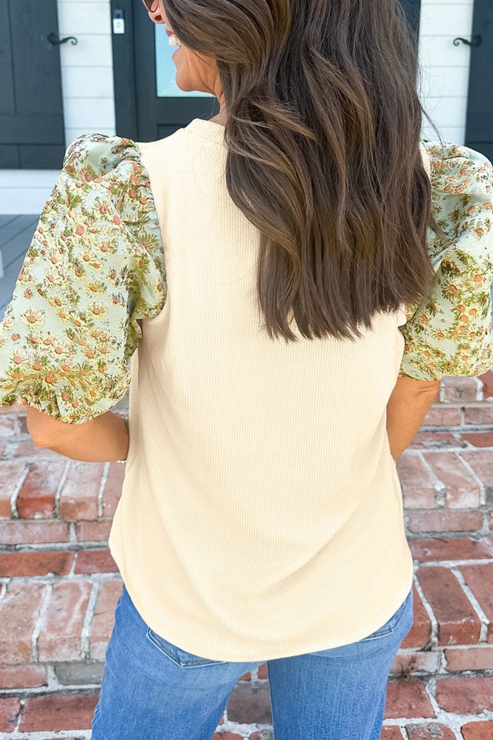 Floral puff sleeve ribbed blouse.