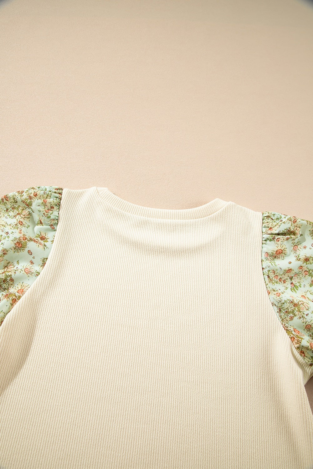 Floral puff sleeve ribbed blouse.