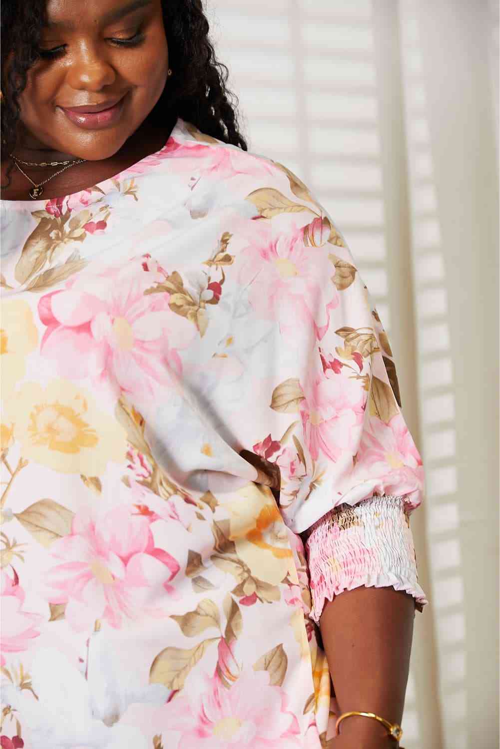 Double Take floral round neck three-quarter sleeve top.