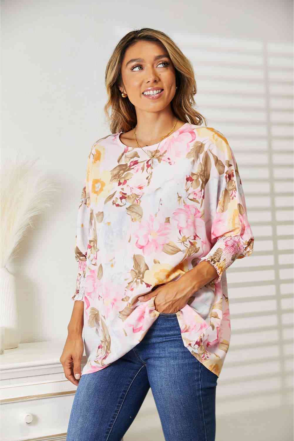 Double Take floral round neck three-quarter sleeve top.