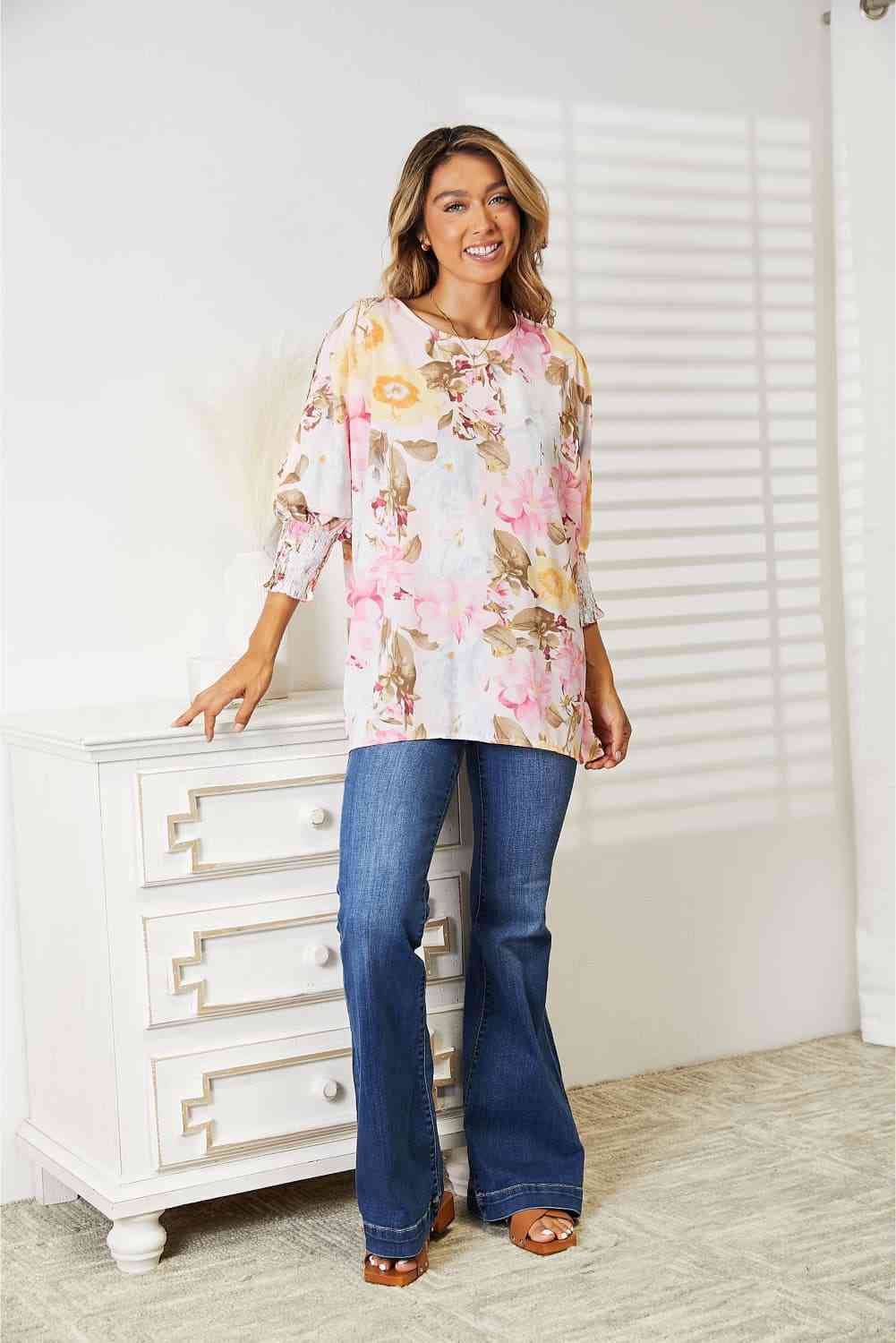Double Take floral round neck three-quarter sleeve top.