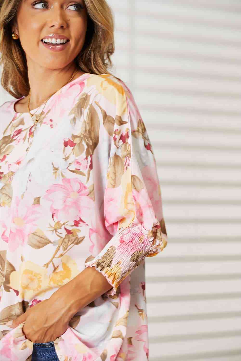 Double Take floral round neck three-quarter sleeve top.