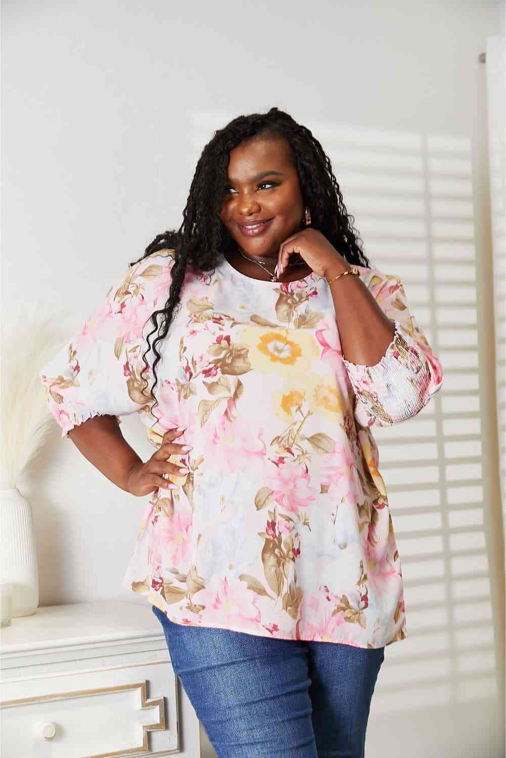 Double Take floral round neck three-quarter sleeve top.