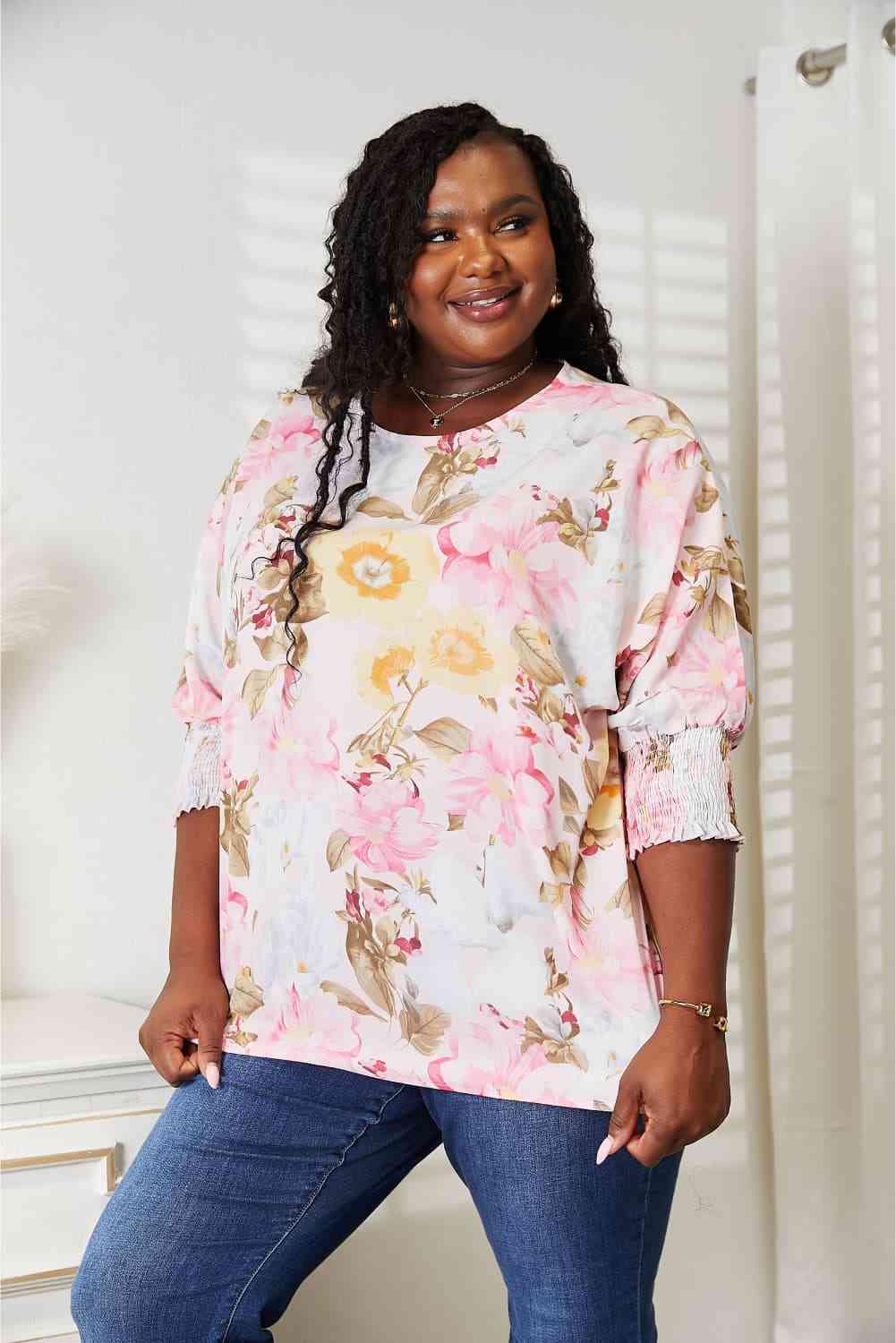 Double Take floral round neck three-quarter sleeve top.