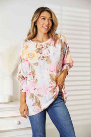Double Take floral round neck three-quarter sleeve top.