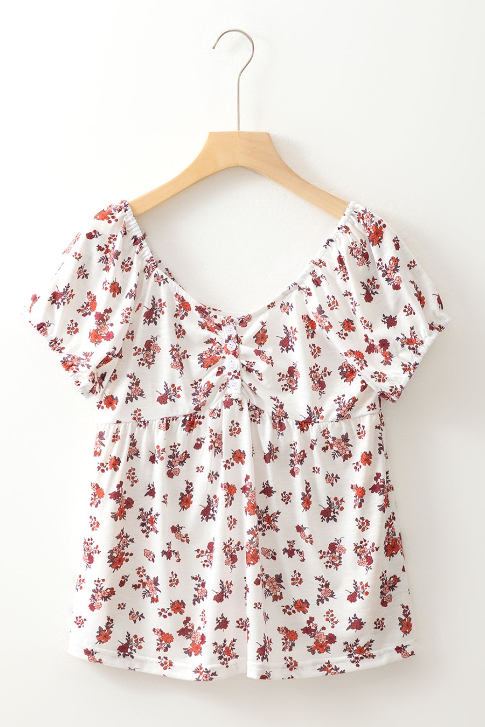 Floral ruched cinched short sleeve blouse.