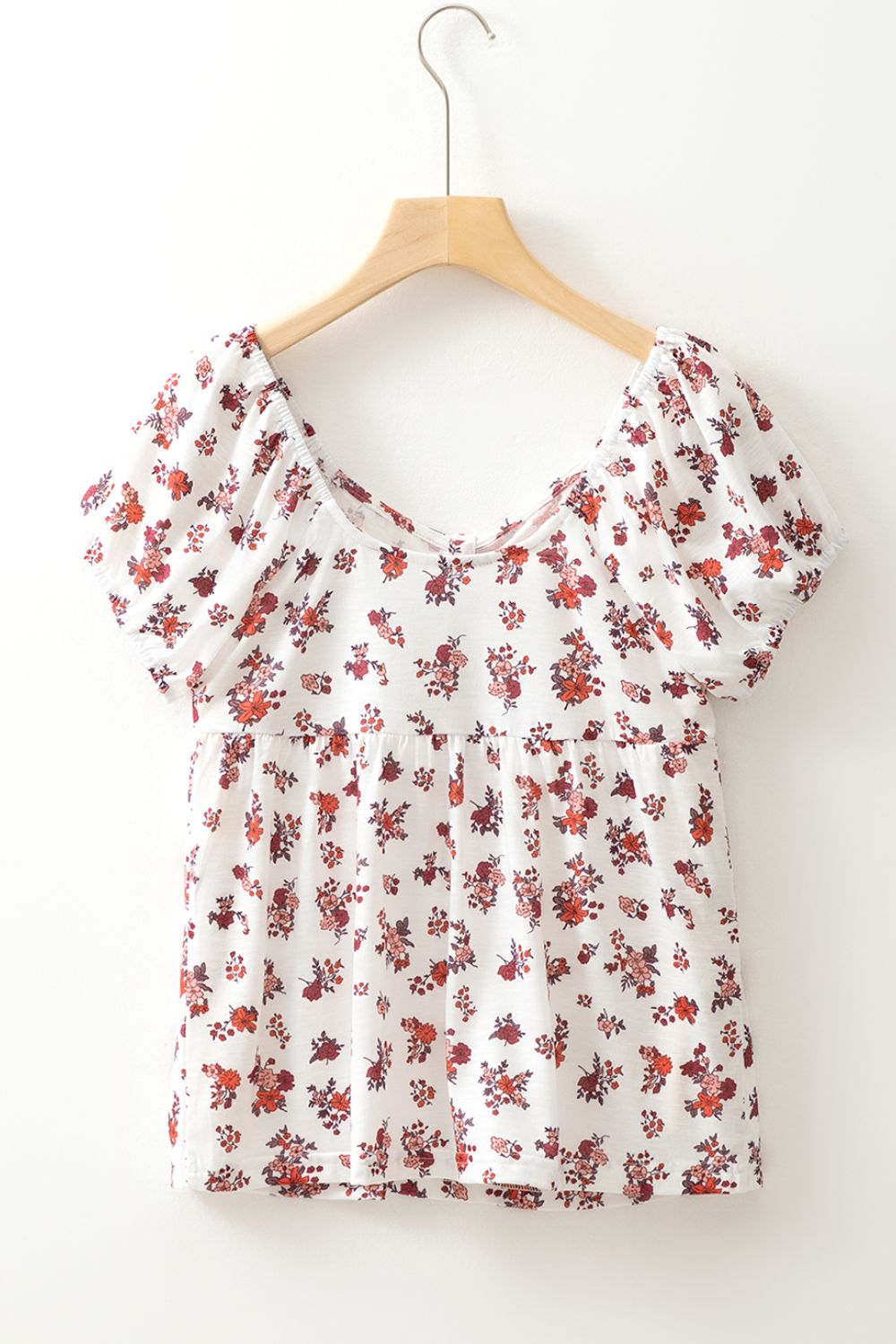 Floral ruched cinched short sleeve blouse.