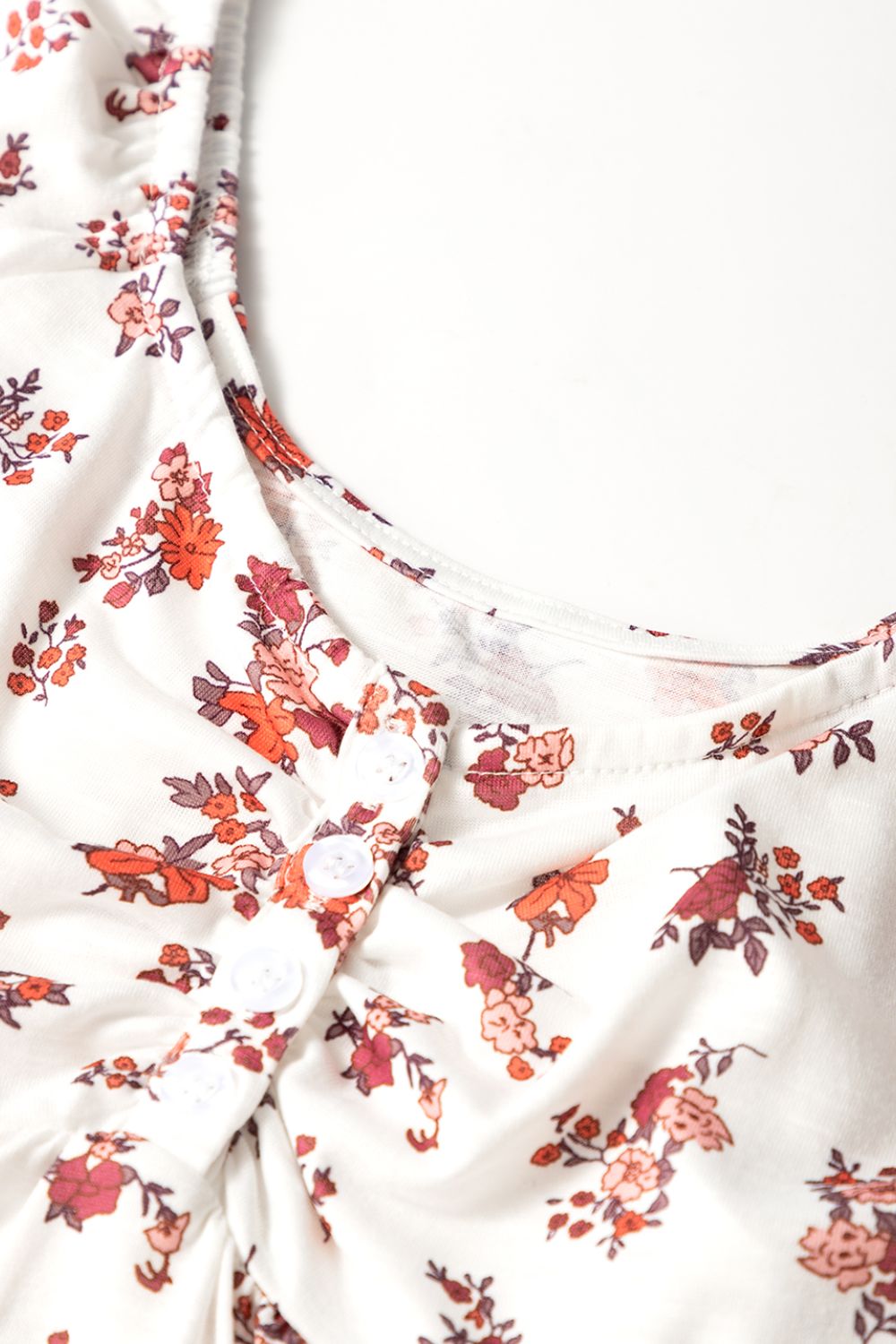 Floral ruched cinched short sleeve blouse.