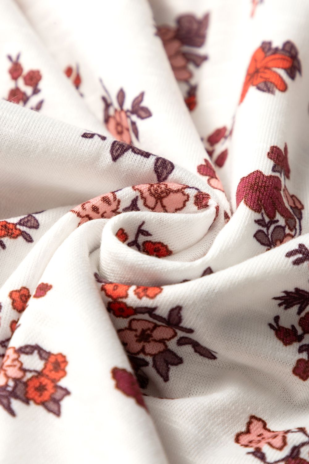 Floral ruched cinched short sleeve blouse.