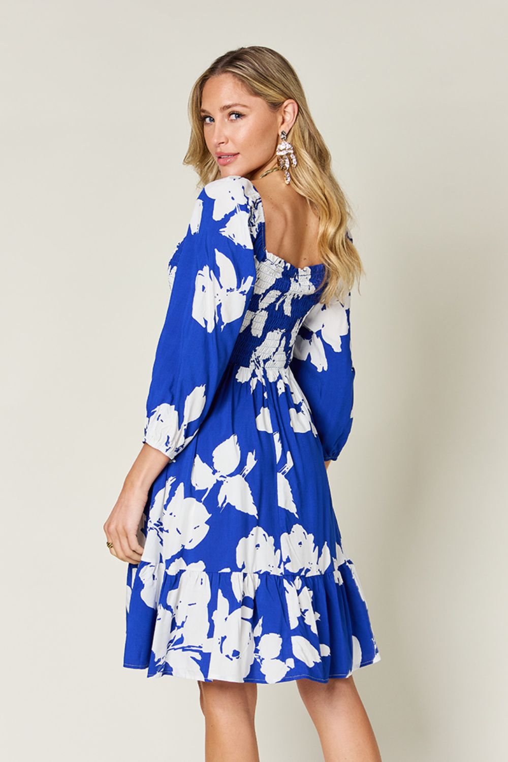 Double Take Full Size Floral Ruffle Hem Smocked Dress with Pockets.
