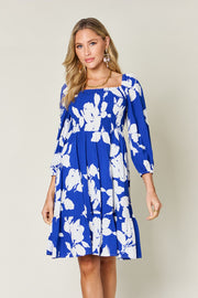 Double Take Full Size Floral Ruffle Hem Smocked Dress with Pockets.