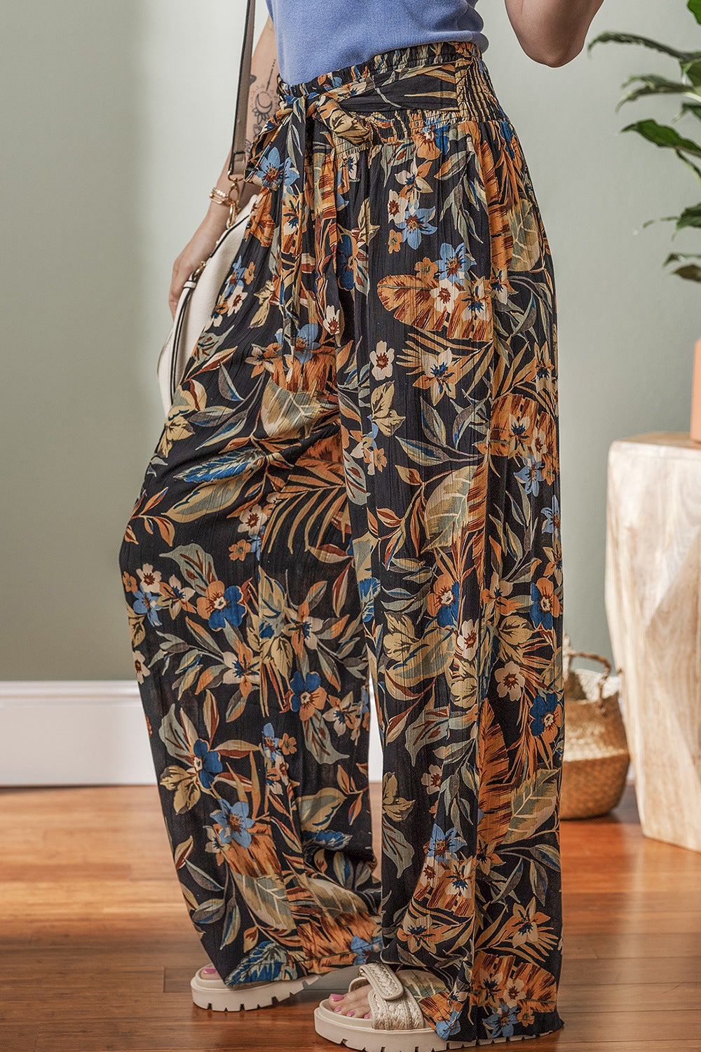Floral shirred high waist wide leg pants with tie, opaque.
