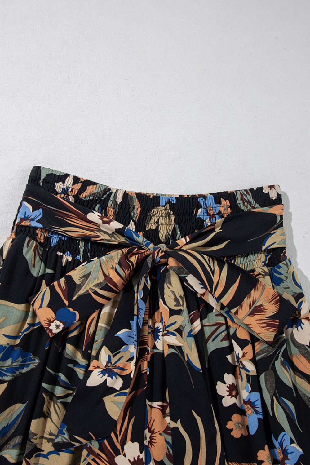 Floral shirred high waist wide leg pants with tie, opaque.