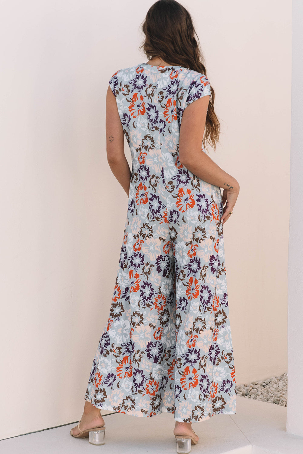 Floral Sleeveless Button Front Wide Leg Jumpsuit.