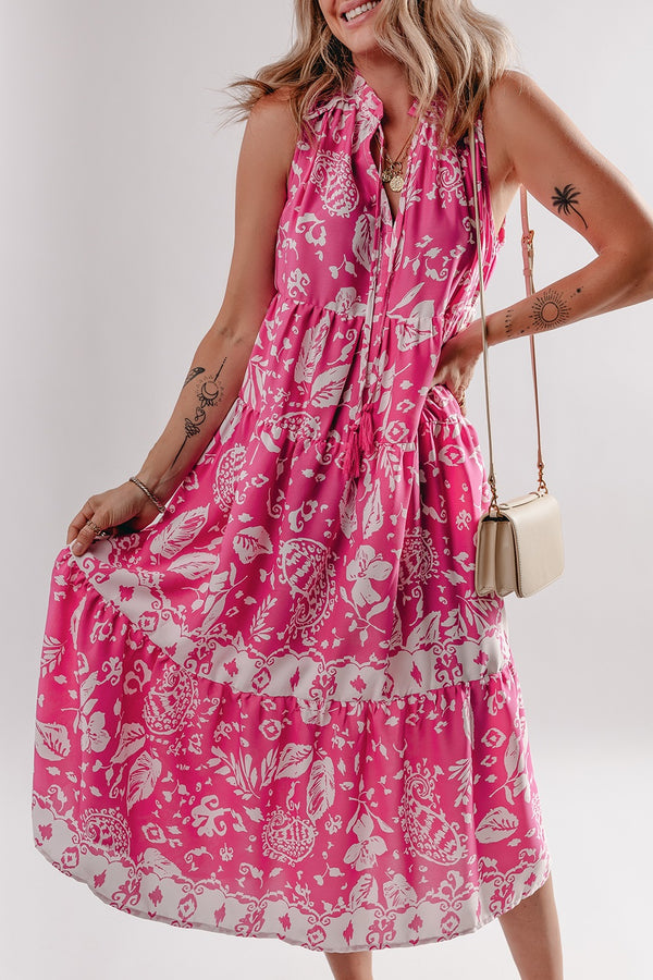 Floral Sleeveless Tasseled Tie Neck Tiered Midi Dress.