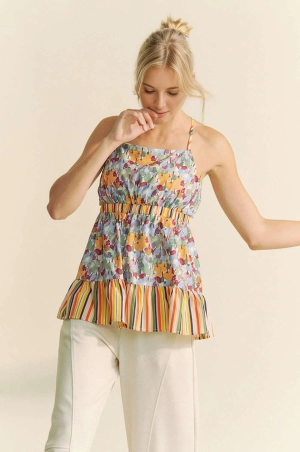 Floral smocked sleeveless top with ruffle and back tie.