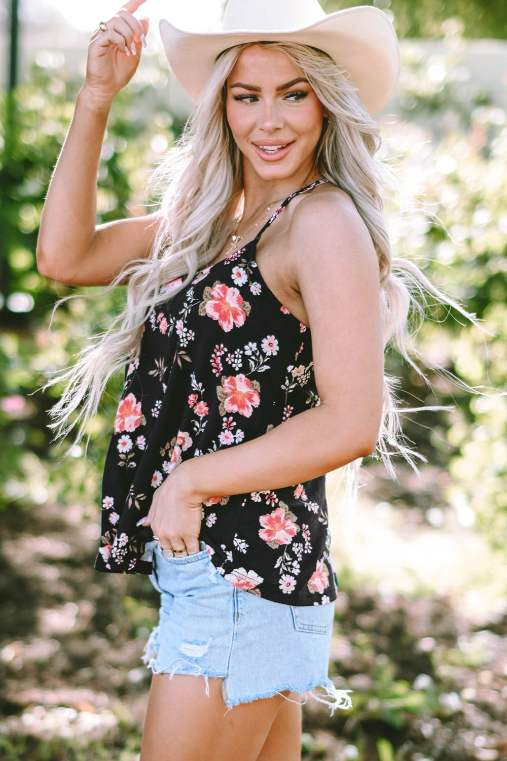 Floral spaghetti strap cami, opaque and slightly stretchy.