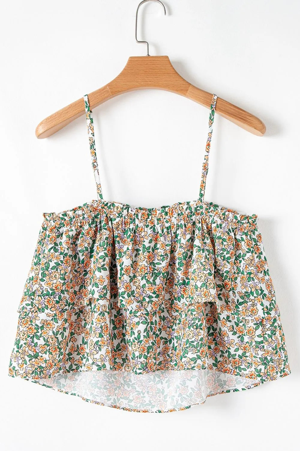 Floral spaghetti strap ruffled cami with layered design.