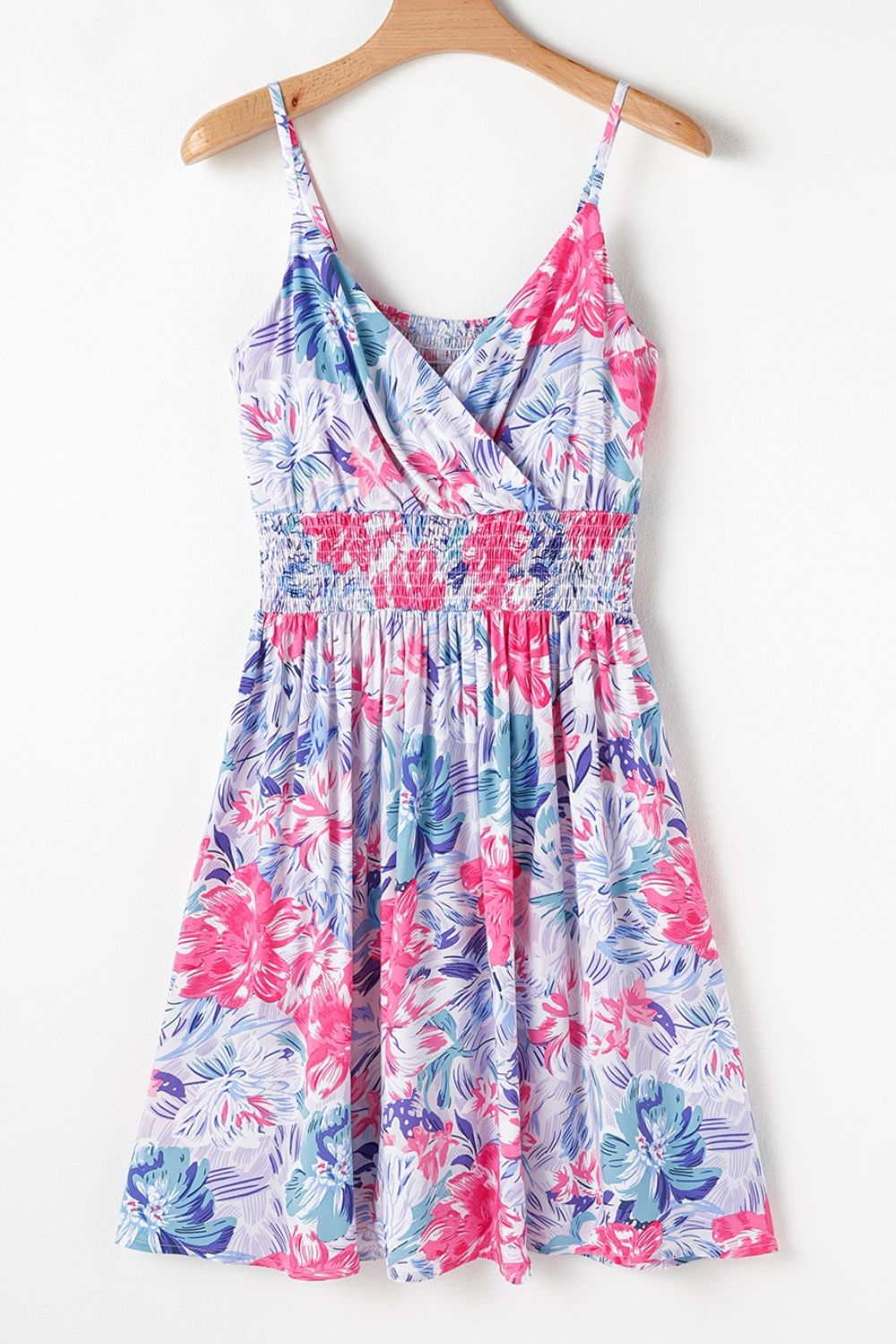 Floral Spaghetti Strap Surplice Neck Shirred Waist Mini Dress.
