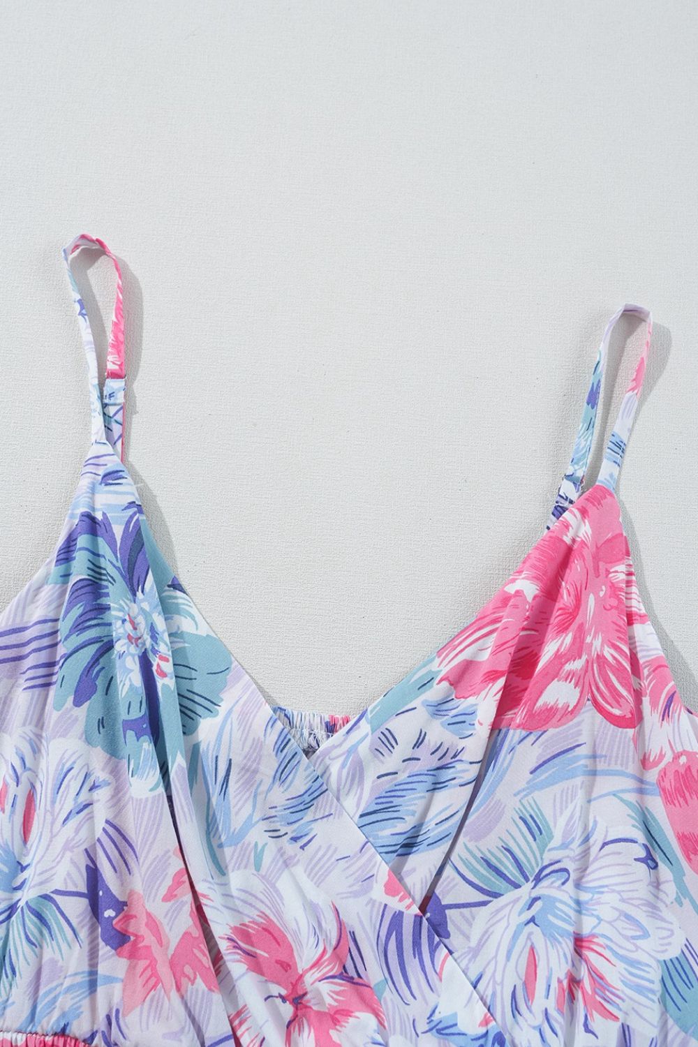 Floral Spaghetti Strap Surplice Neck Shirred Waist Mini Dress.