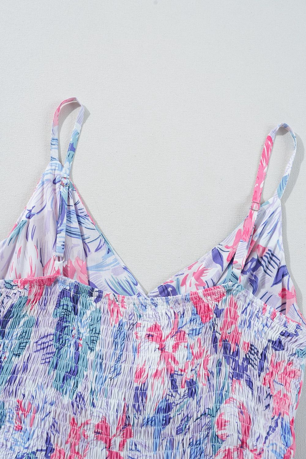 Floral Spaghetti Strap Surplice Neck Shirred Waist Mini Dress.