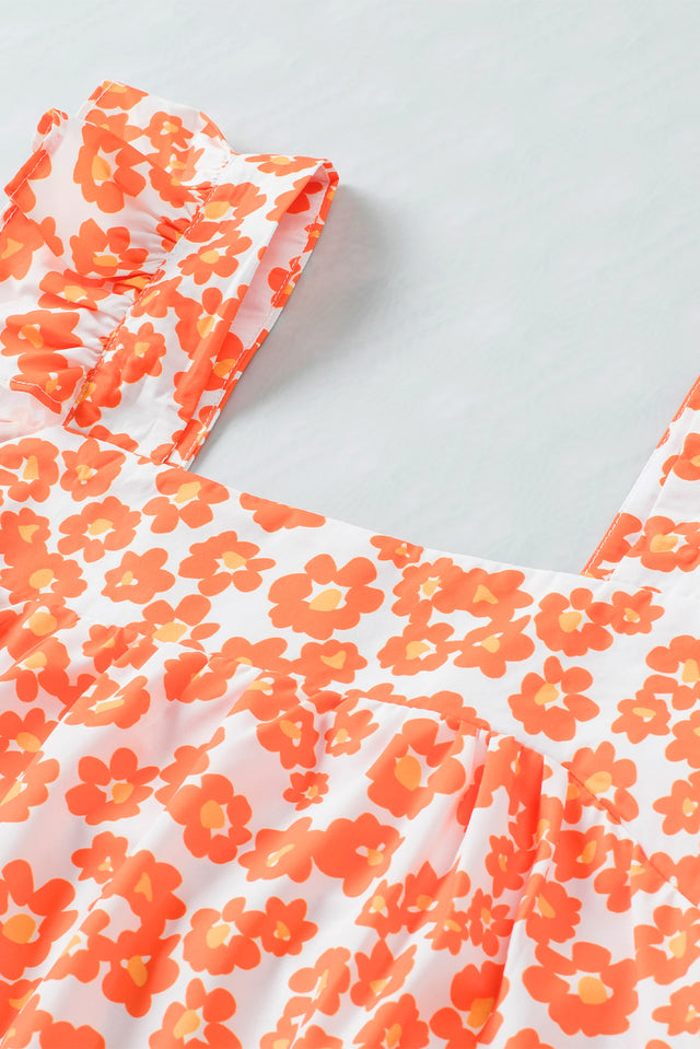 Floral square neck cap sleeve tank top with flutter sleeves.