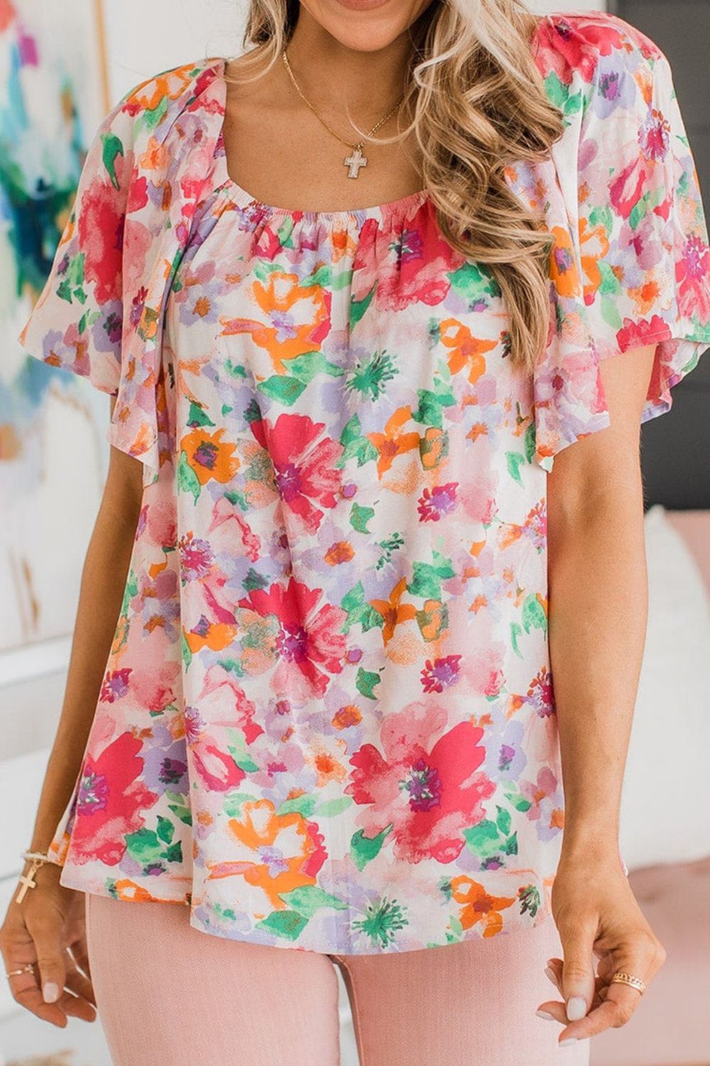 Floral square neck ruffle sleeve blouse.