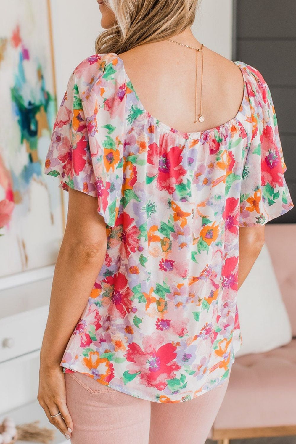 Floral square neck ruffle sleeve blouse.