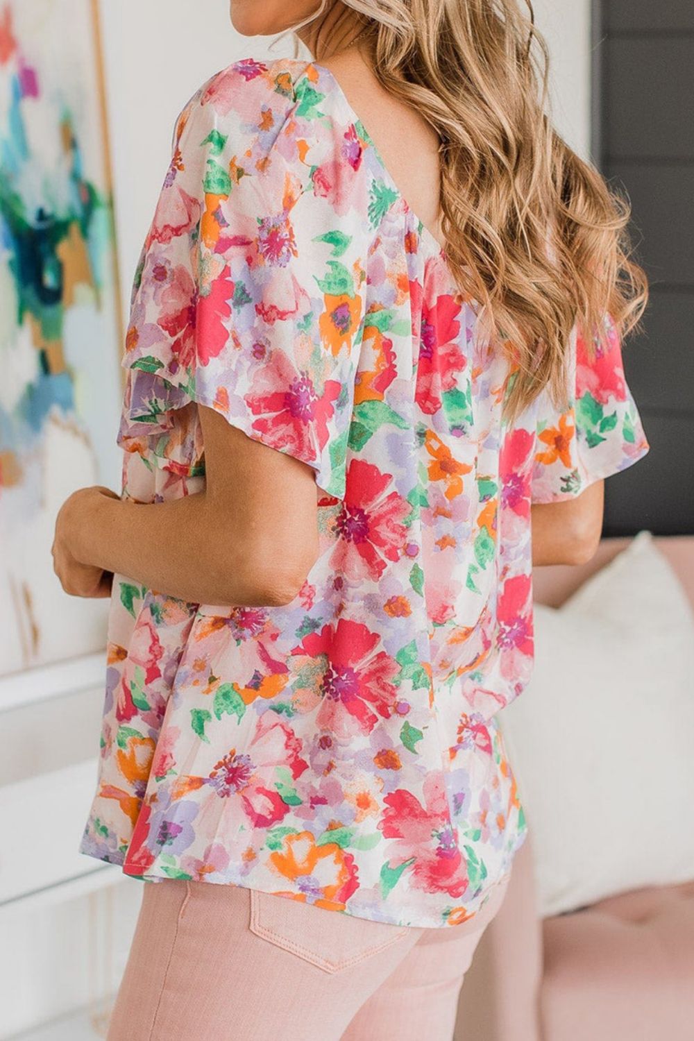 Floral square neck ruffle sleeve blouse.