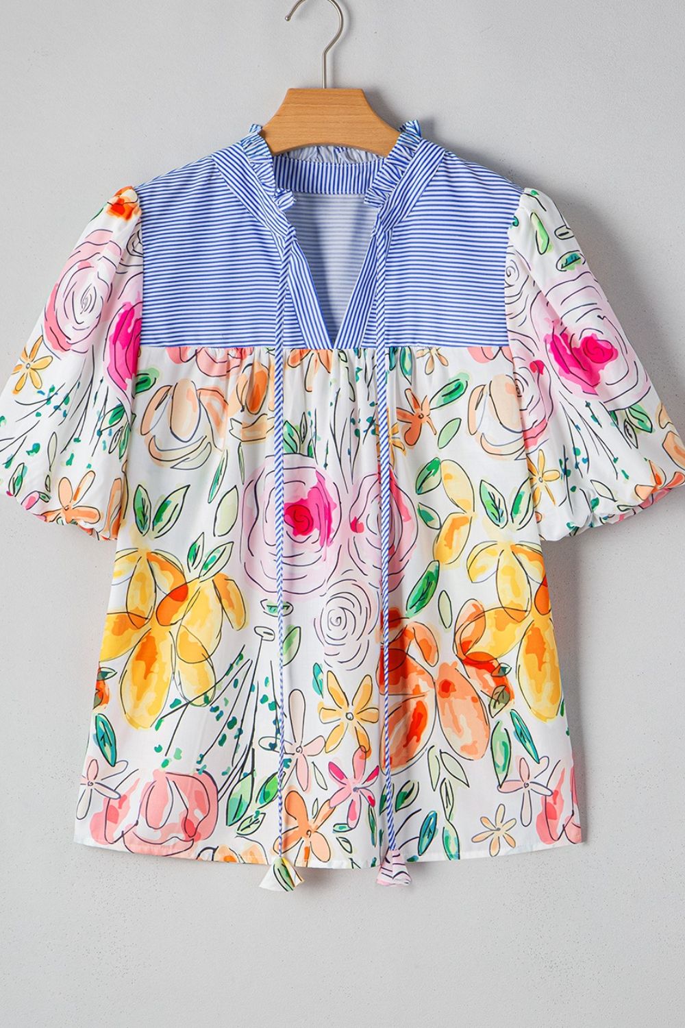 Floral striped yoke frilled tie neck puff short sleeve blouse.