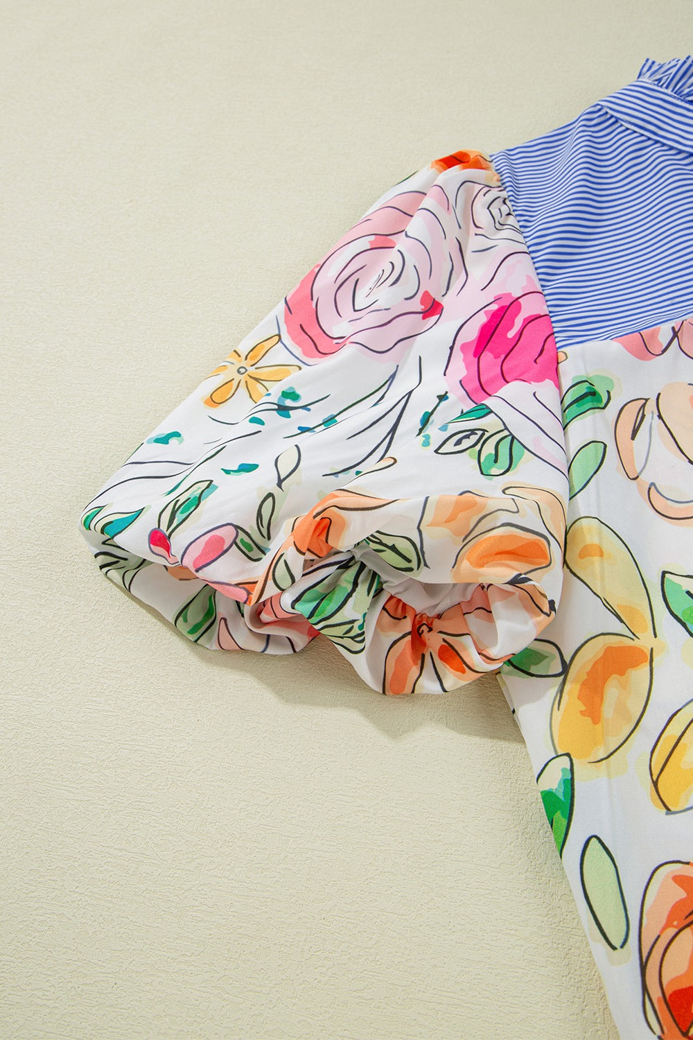 Floral striped yoke frilled tie neck puff short sleeve blouse.