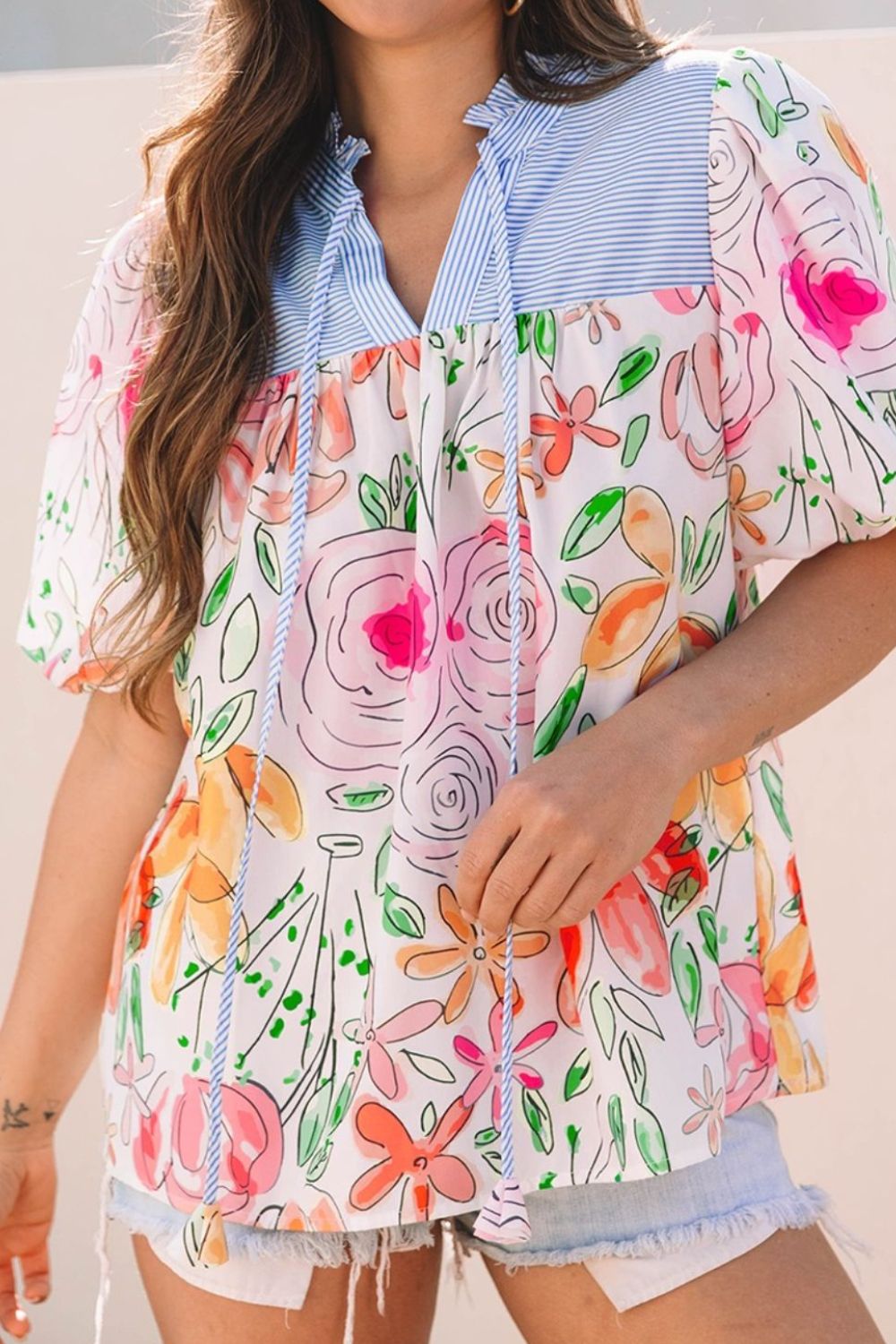 Floral striped yoke frilled tie neck puff short sleeve blouse.