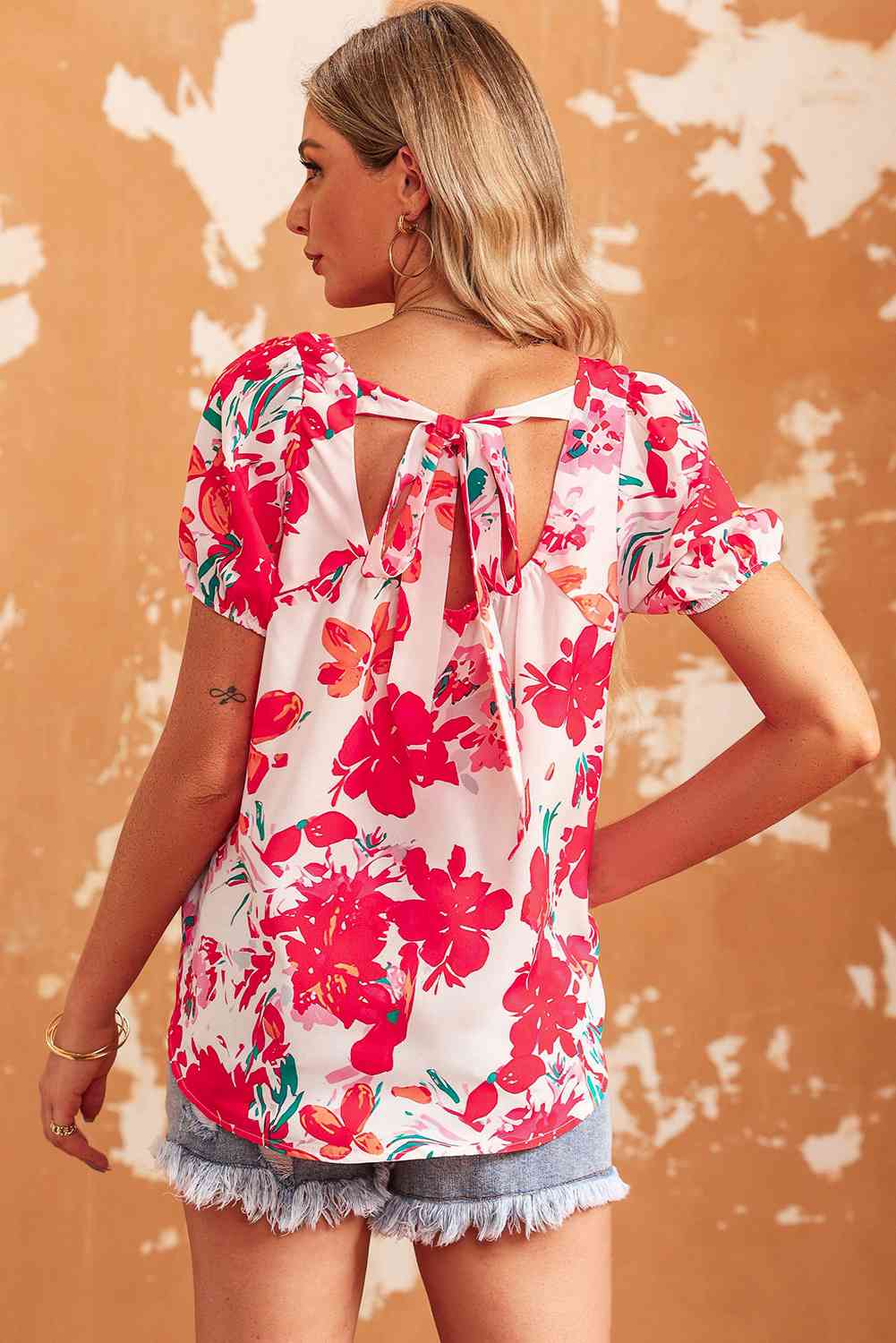 Floral tie back square neck blouse.