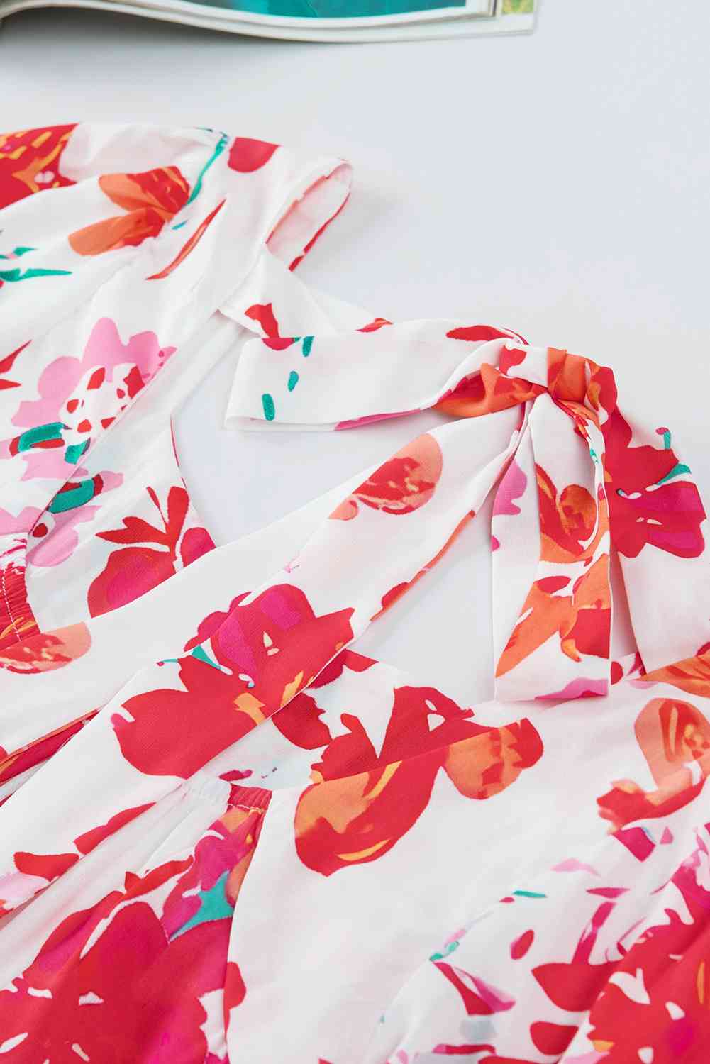 Floral tie back square neck blouse.