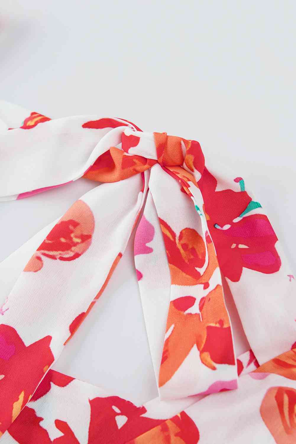 Floral tie back square neck blouse.