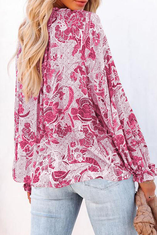 Floral tie neck flounce sleeve blouse.