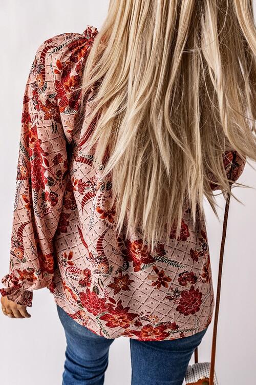 Floral tie neck flounce sleeve blouse.