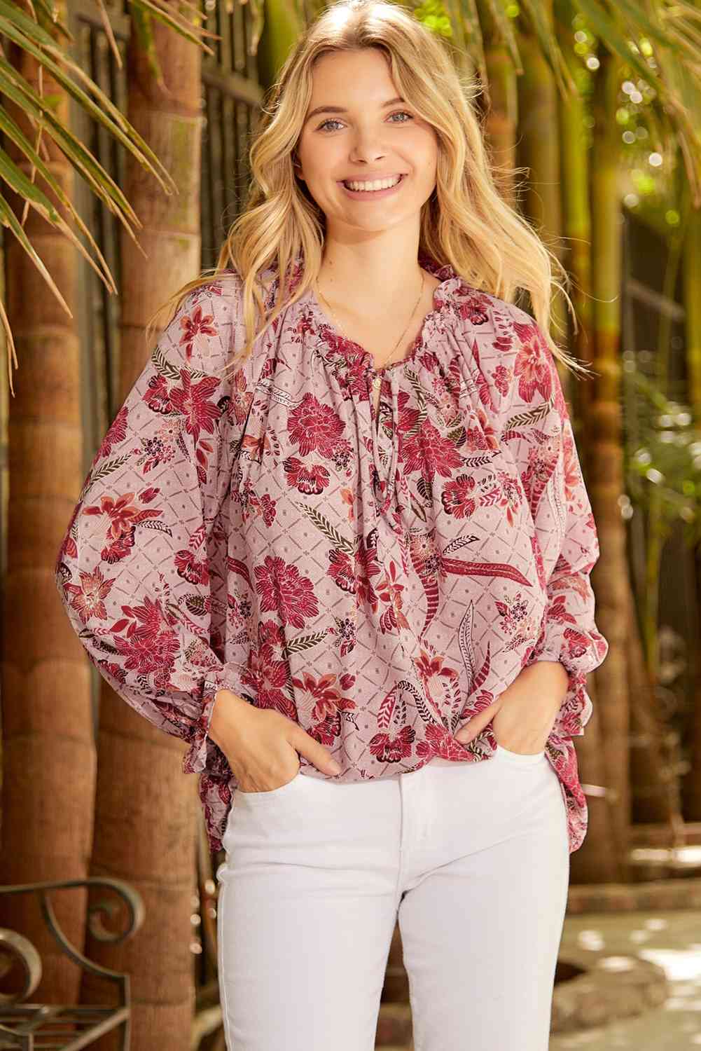 Floral tie neck flounce sleeve blouse.