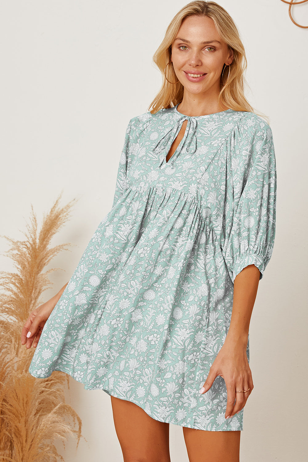 Floral Tie Neck Ruched Babydoll Dress.