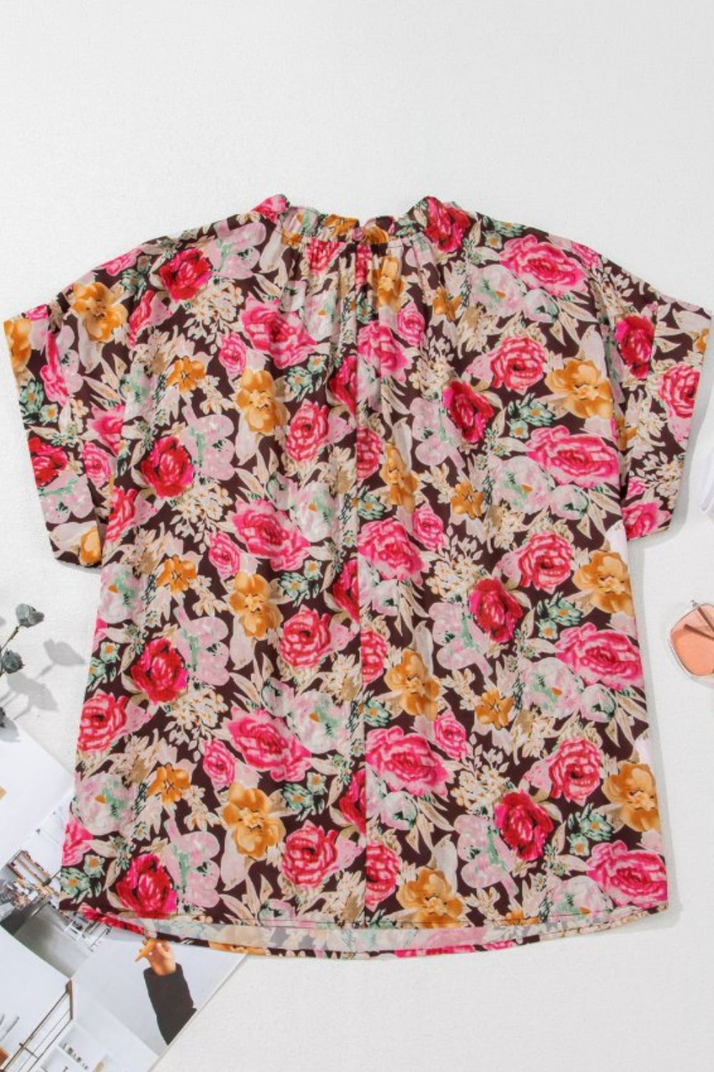 Floral tie neck short sleeve blouse with frill.