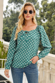 Floral tied printed long sleeve blouse.