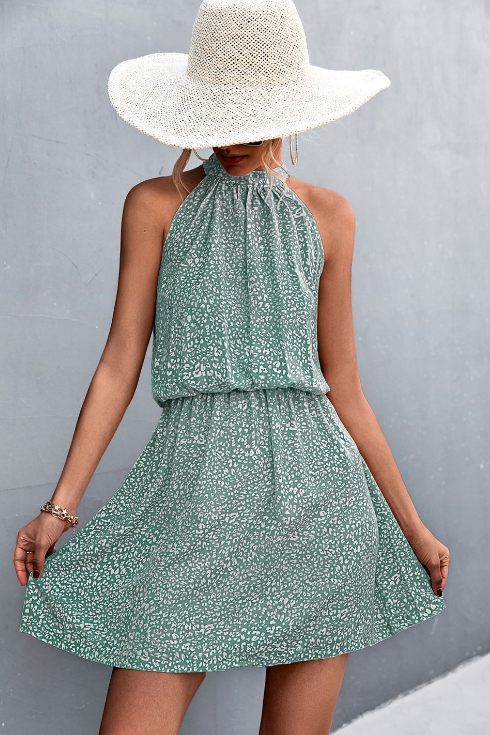Floral Tied Sleeveless Mini Dress.