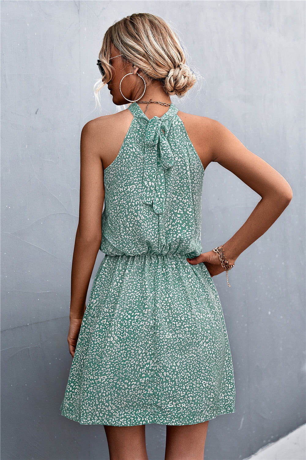 Floral Tied Sleeveless Mini Dress.