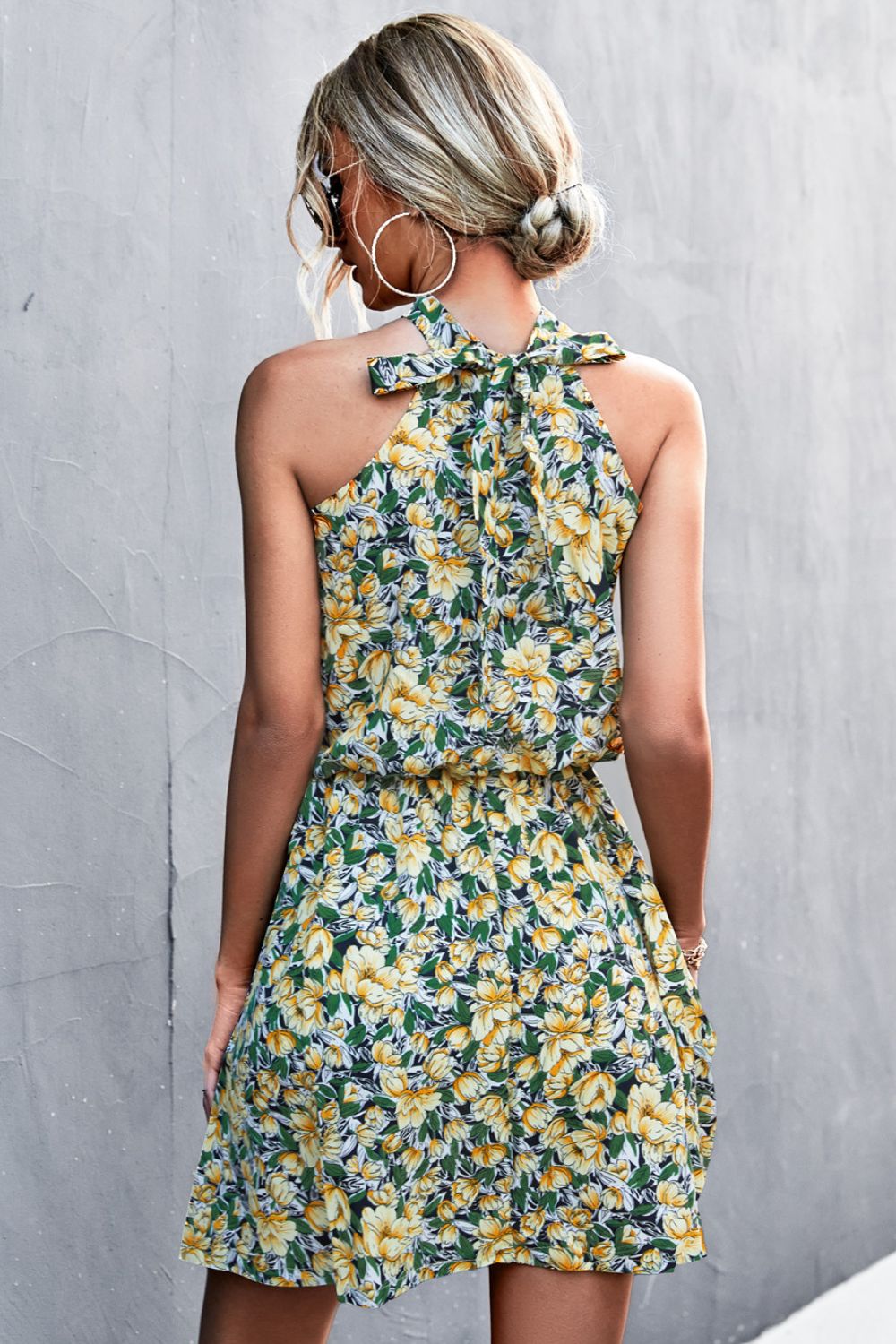 Floral Tied Sleeveless Mini Dress.