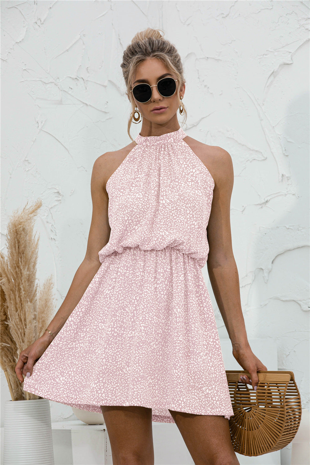 Floral Tied Sleeveless Mini Dress.