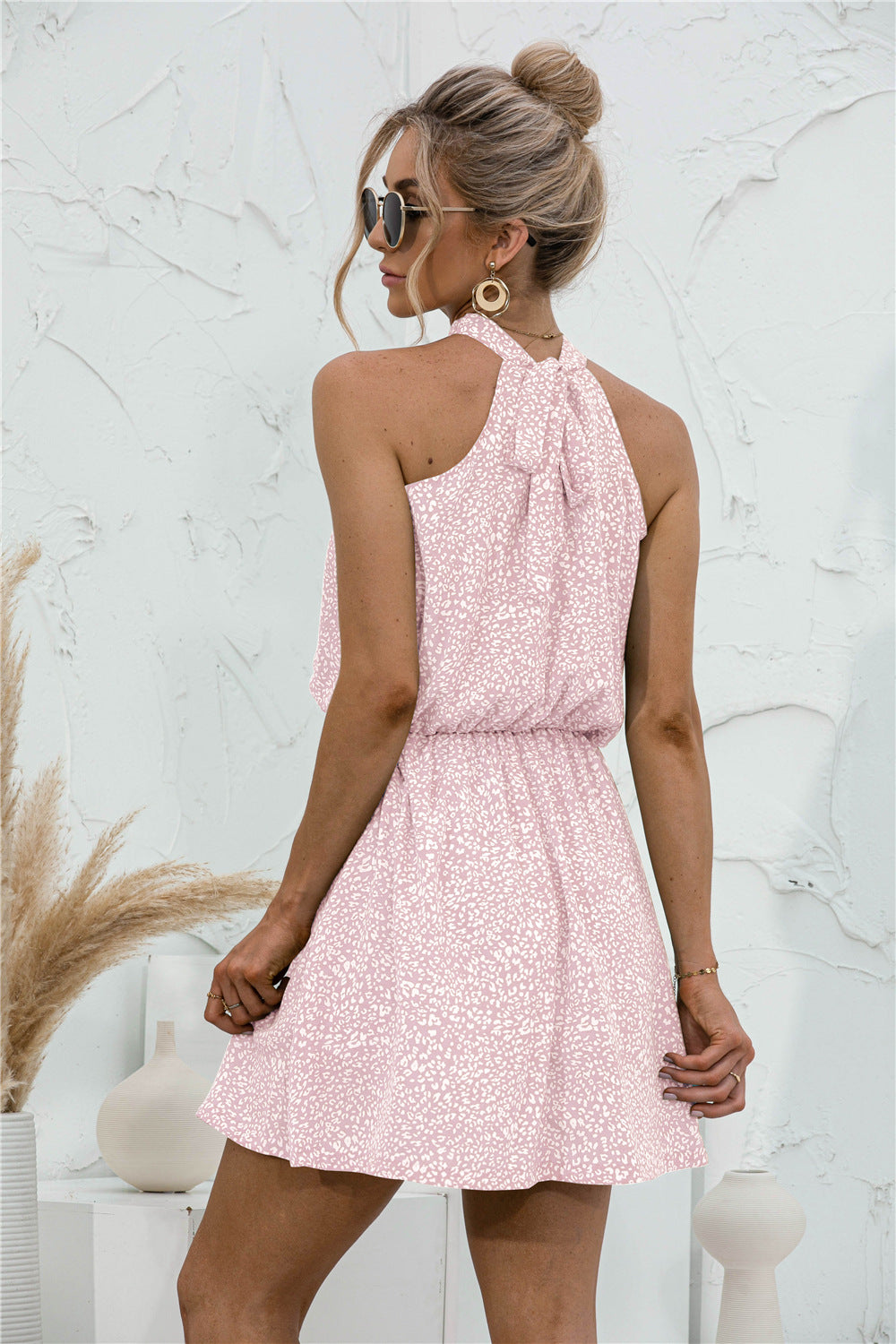 Floral Tied Sleeveless Mini Dress.