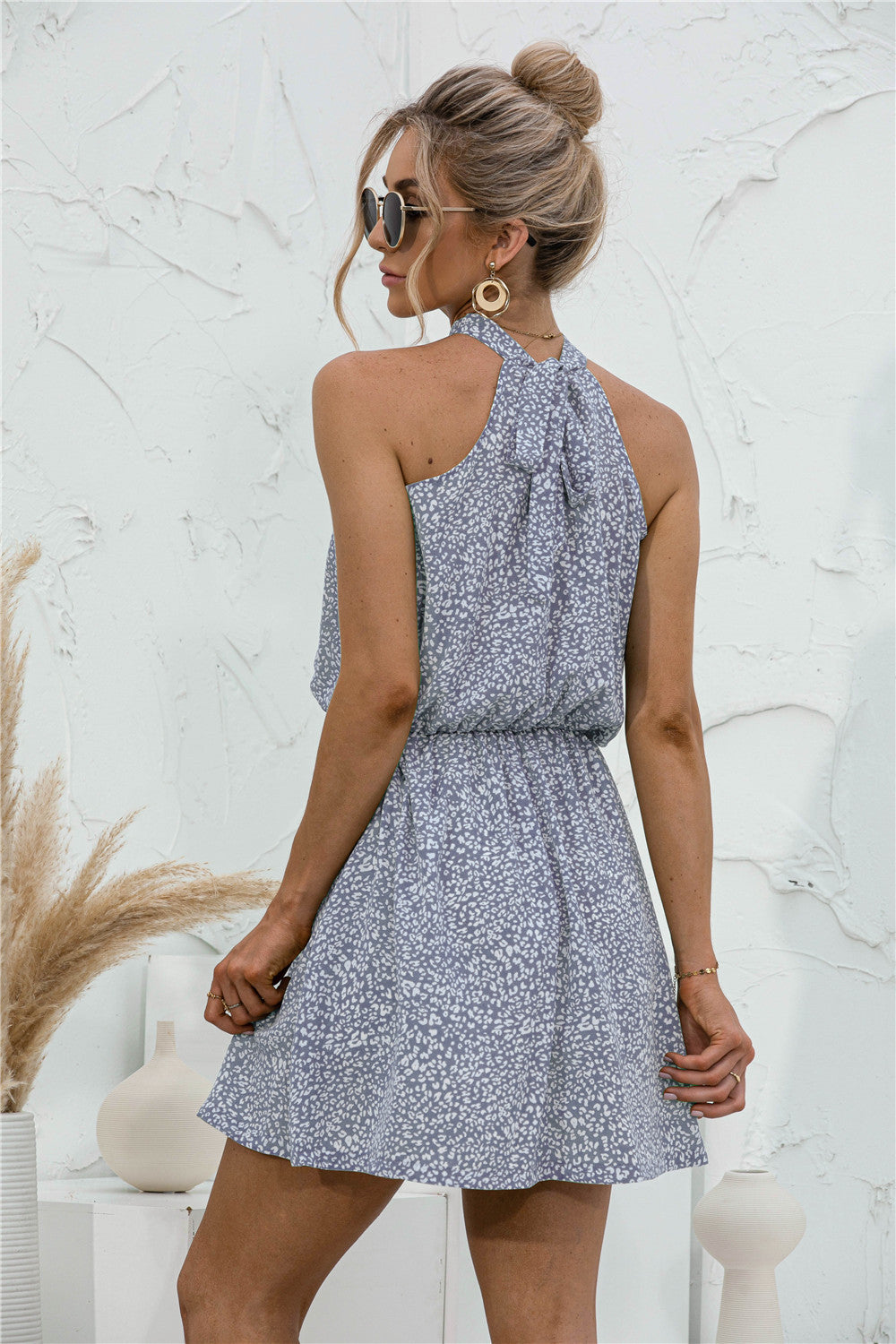 Floral Tied Sleeveless Mini Dress.