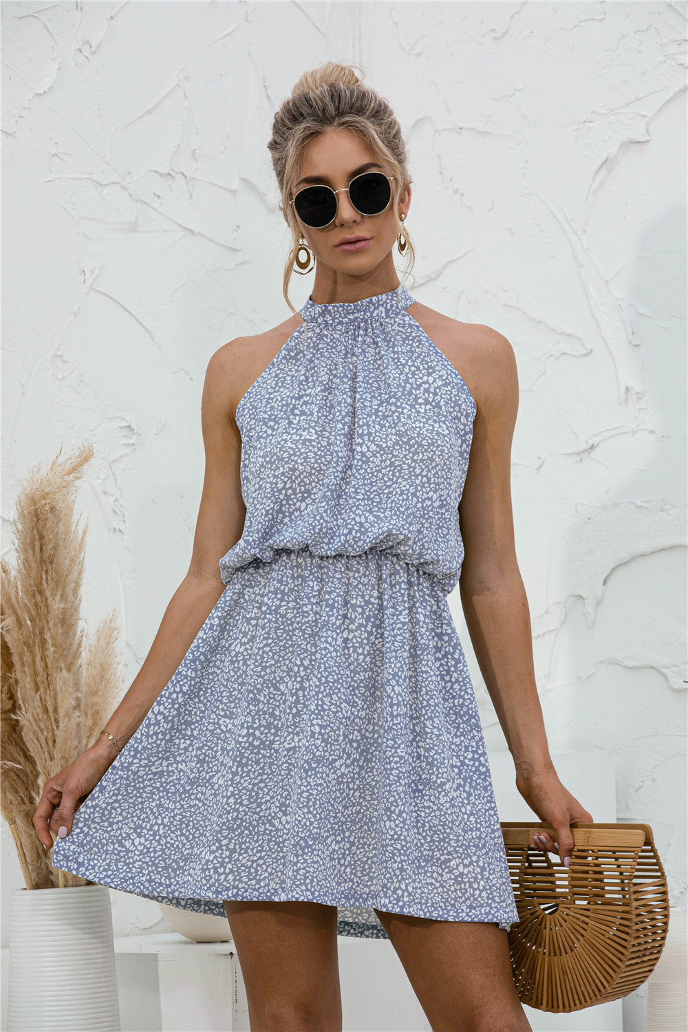 Floral Tied Sleeveless Mini Dress.